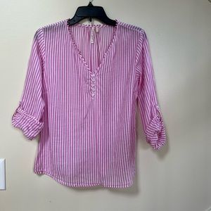 Pink and white striped blouse.